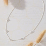 Sanctuary Bezel Set White Cubic Zirconia Station Necklace in sterling silver by Skōsh Jewelry