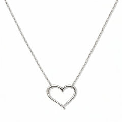 A Tender Heart Necklace by Skōsh Jewelry, featuring a large open heart outline set on a fine sterling silver chain, displayed against a white background.