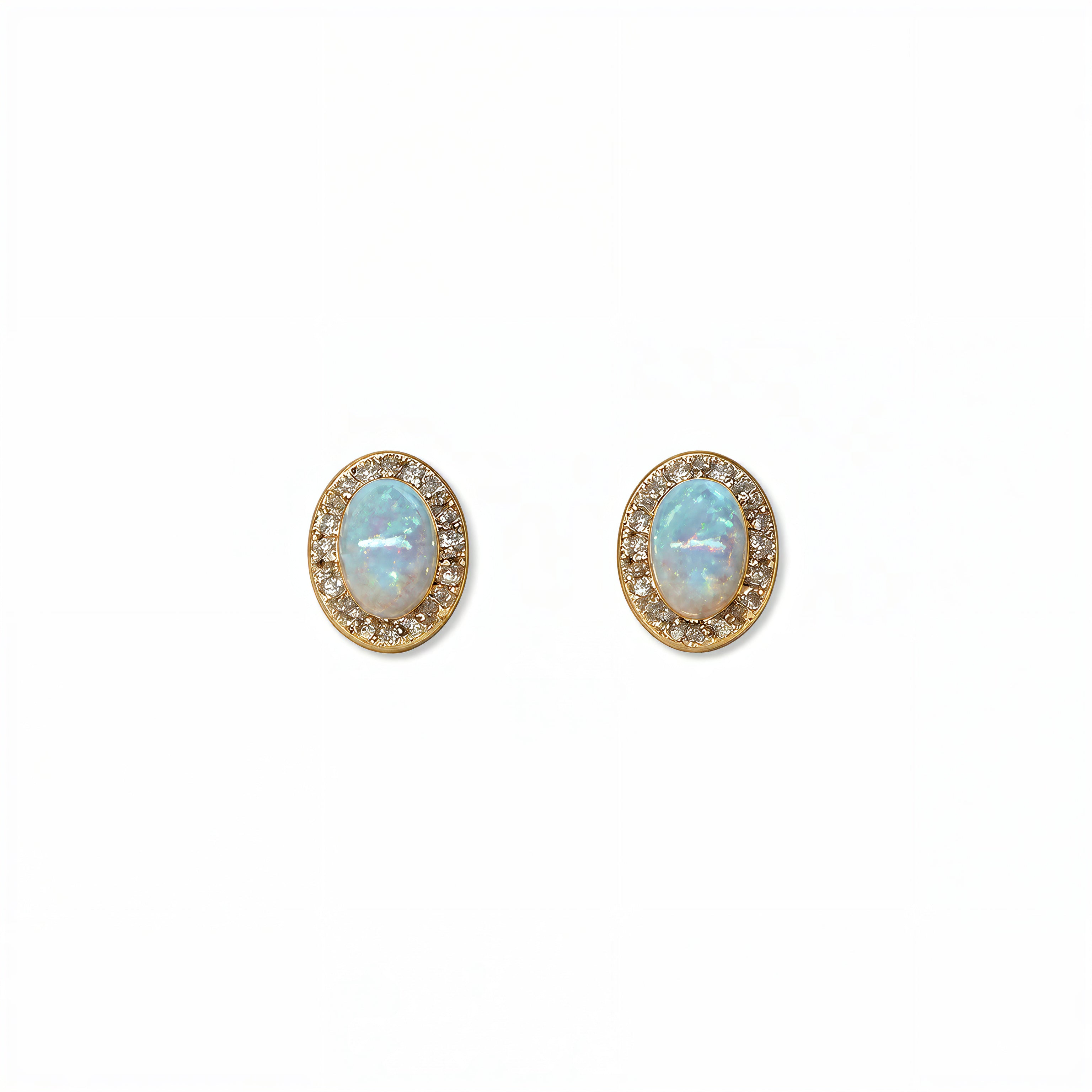 A pair of Ethereal Opal with White Cubic Zirconia Halo Earrings by Skōsh Jewelry, featuring oval iridescent opals framed by halos of small clear stones in gold, displayed against a white background.
