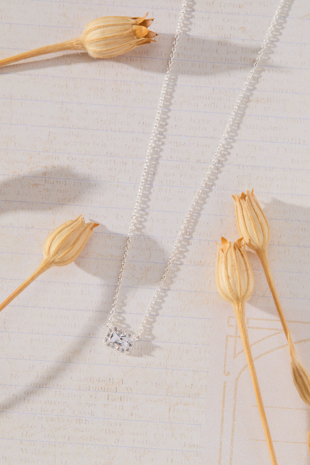 Radiant Grace Rectangle White Cubic Zirconia with Halo Necklace in sterling silver by Skōsh Jewelry