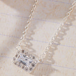 Radiant Grace Rectangle White Cubic Zirconia with Halo Necklace in sterling silver by Skōsh Jewelry