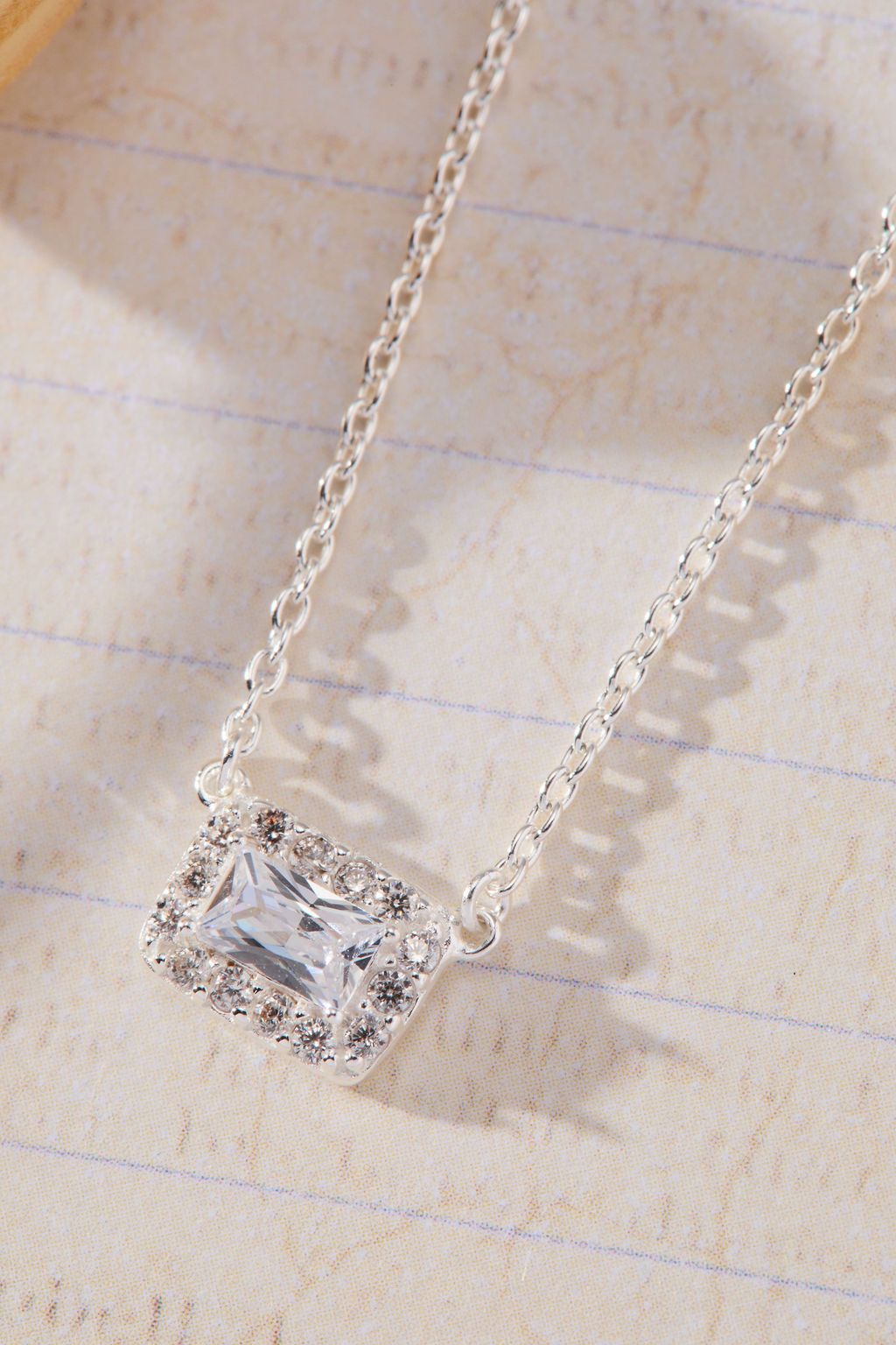 Radiant Grace Rectangle White Cubic Zirconia with Halo Necklace in sterling silver by Skōsh Jewelry