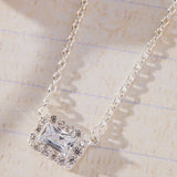 Radiant Grace Rectangle White Cubic Zirconia with Halo Necklace in sterling silver by Skōsh Jewelry