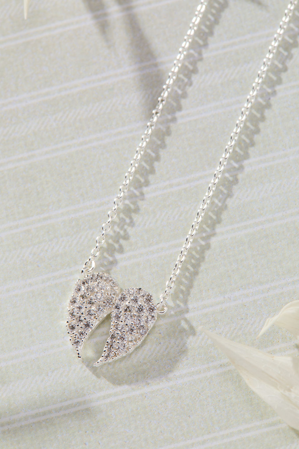 Celestial Pavé White Cubic Zirconia Wings Necklace in sterling silver by Skōsh Jewelry