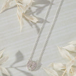 Celestial Pavé White Cubic Zirconia Wings Necklace in sterling silver by Skōsh Jewelry