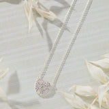 Celestial Pavé White Cubic Zirconia Wings Necklace in sterling silver by Skōsh Jewelry