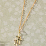 Trinity Triple Cross Pendant Necklace in 14K gold over sterling silver by Skōsh Jewelry