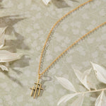 Trinity Triple Cross Pendant Necklace in 14K gold over sterling silver by Skōsh Jewelry