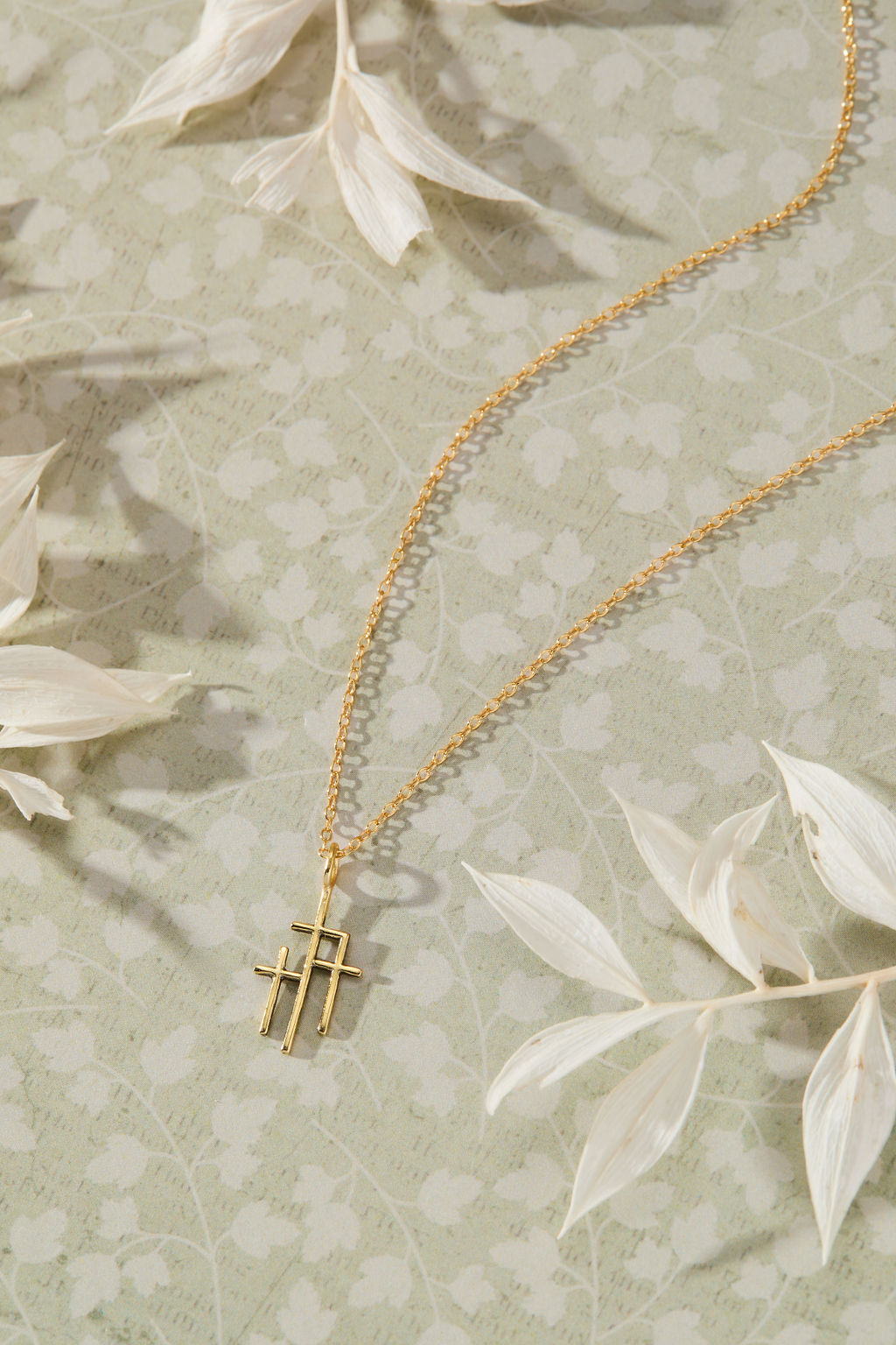 Trinity Triple Cross Pendant Necklace in 14K gold over sterling silver by Skōsh Jewelry