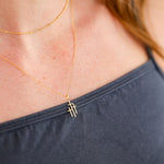 Trinity Triple Cross Pendant Necklace in 14K gold over sterling silver by Skōsh Jewelry