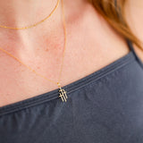 Trinity Triple Cross Pendant Necklace in 14K gold over sterling silver by Skōsh Jewelry