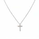 A Classic Light White Cubic Zirconia Cross Necklace by Skōsh Jewelry, featuring a classic cross lined with small clear stones on a fine sterling silver chain, displayed against a white background.