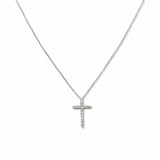 A Classic Light White Cubic Zirconia Cross Necklace by Skōsh Jewelry, featuring a classic cross lined with small clear stones on a fine sterling silver chain, displayed against a white background.