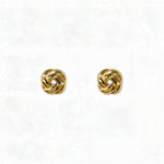 A pair of Knotted Stud Earrings by Skōsh Jewelry, featuring polished gold studs shaped like twisted love knots, displayed against a white background.