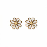A pair of Skōsh Kids Daisy Earrings by Skōsh Jewelry, featuring white enamel daisy flowers with yellow centers outlined in gold, displayed against a white background.