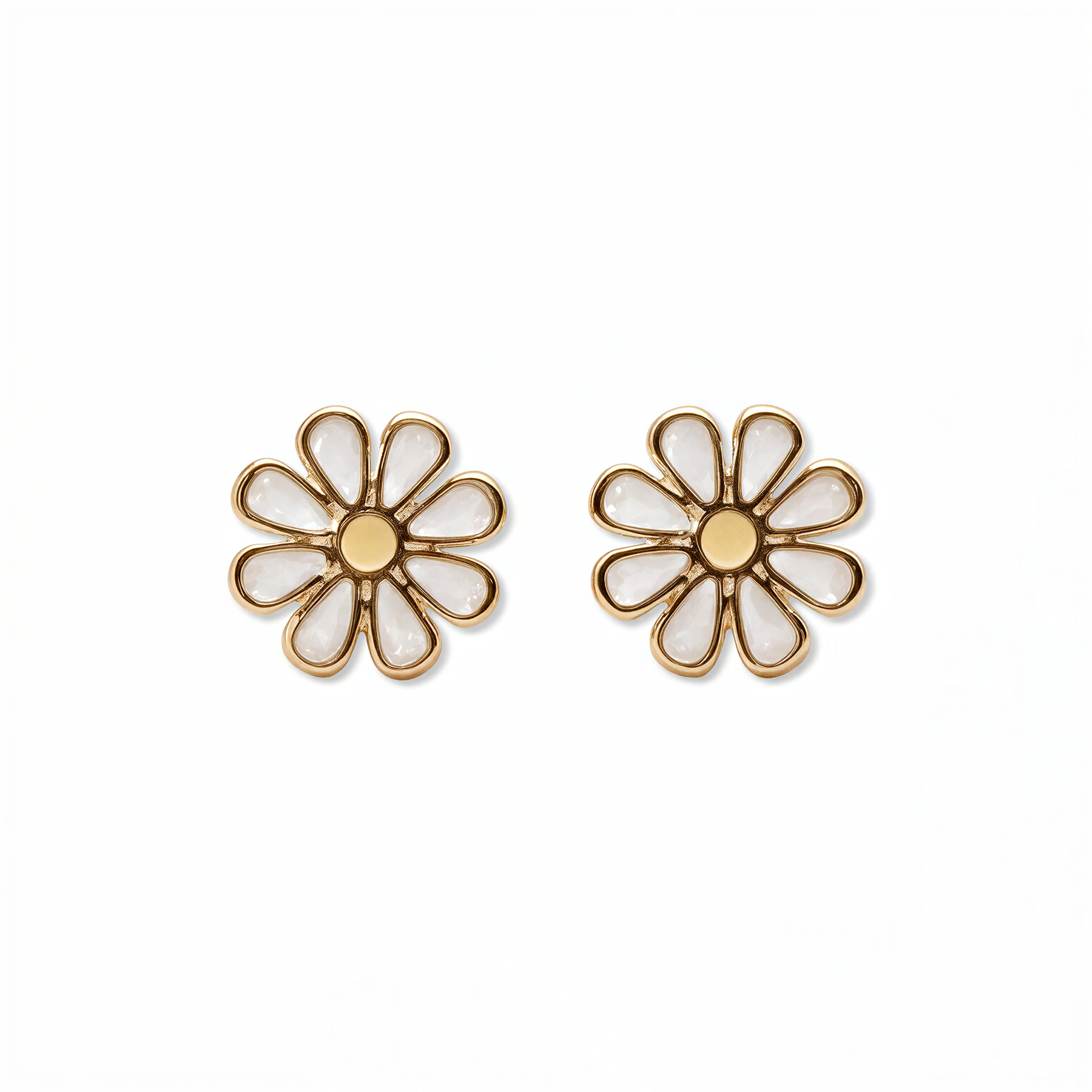 A pair of Skōsh Kids Daisy Earrings by Skōsh Jewelry, featuring white enamel daisy flowers with yellow centers outlined in gold, displayed against a white background.