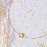 Smiley Face Necklace in 14K gold over sterling silver by Skōsh Jewelry