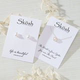 Classic Pearl with White Cubic Zirconia Accent Earrings in sterling silver by Skōsh Jewelry