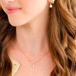 Classic Drop Pearl with White Cubic Zirconia Accent Necklace in 14K gold over sterling silver by Skōsh Jewelry