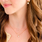 Classic Drop Pearl with White Cubic Zirconia Accent Necklace in 14K gold over sterling silver by Skōsh Jewelry