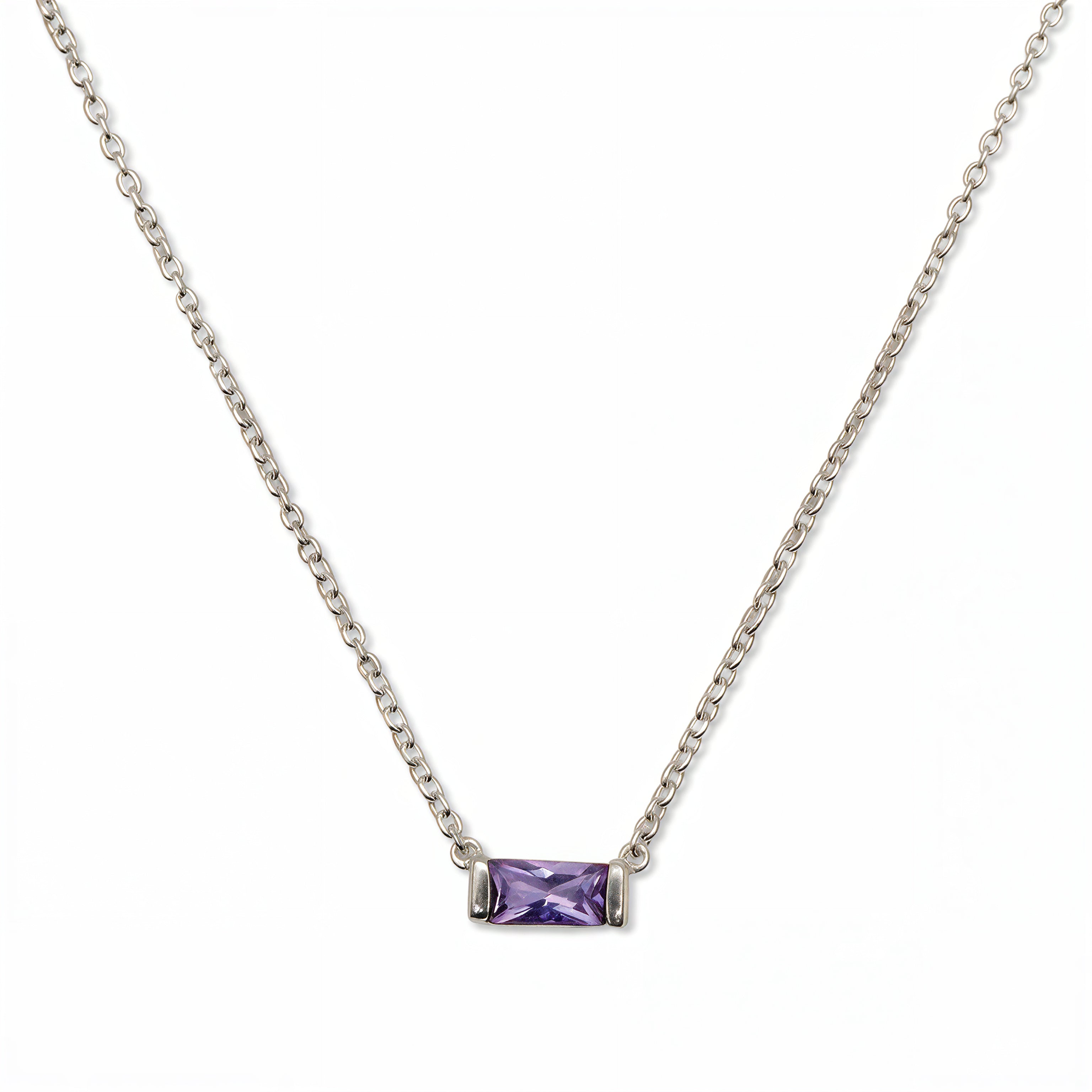 A June Birthstone Lavender Cubic Zirconia Baguette Necklace by Skōsh Jewelry, featuring a slim rectangular light purple baguette stone set horizontally on a fine sterling silver chain, displayed against a white background.