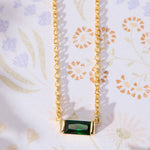 May Birthstone Emerald Cubic Zirconia Baguette Necklace in 14K gold over sterling silver by Skōsh Jewelry