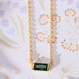 May Birthstone Emerald Cubic Zirconia Baguette Necklace in 14K gold over sterling silver by Skōsh Jewelry