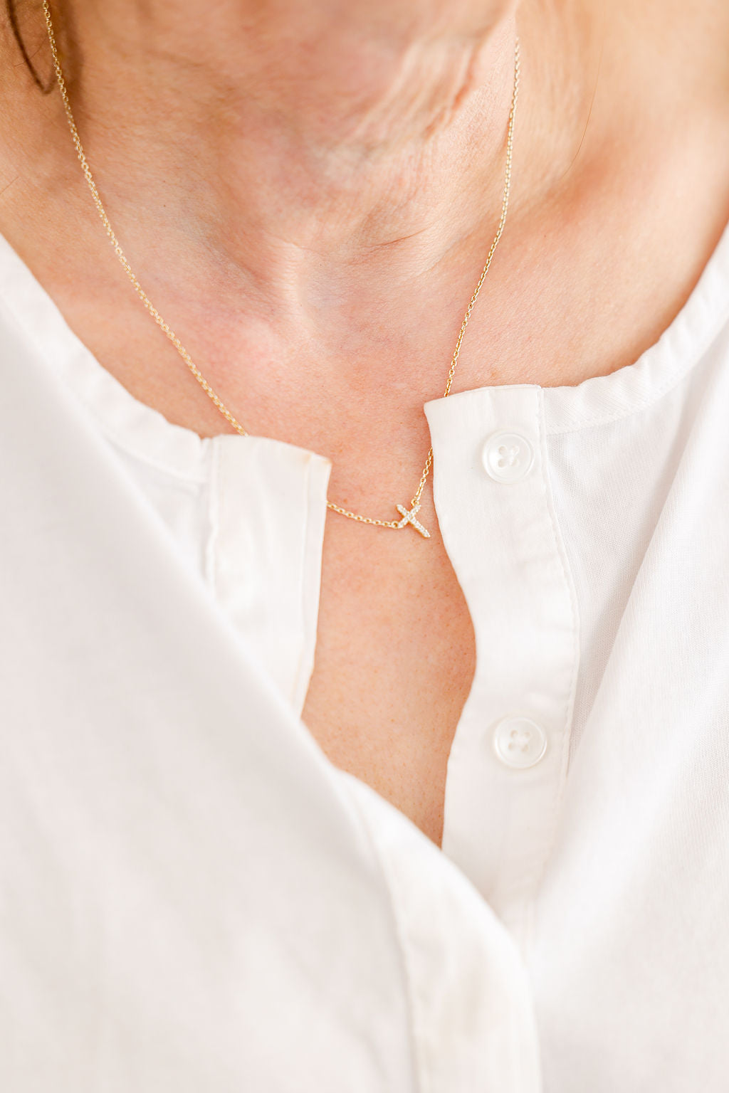 Endless Faith Mini Cross with White Cubic Zirconia Necklace in 14K gold over sterling silver by Skōsh Jewelry
