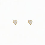 A pair of Polished Mini Heart Stud Earrings by Skōsh Jewelry, featuring tiny heart-shaped studs in gold, displayed against a white background.