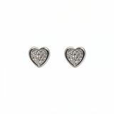 A pair of White Cubic Zirconia Pavé Heart Stud Earrings by Skōsh Jewelry, featuring heart-shaped studs covered in small clear pavé stones set in sterling silver, displayed against a white background.