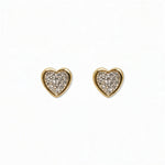 A pair of White Cubic Zirconia Pavé Heart Stud Earrings by Skōsh Jewelry, featuring heart-shaped studs covered in small clear pavé stones set in gold, displayed against a white background.