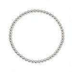 A Moonbeam 3mm Beaded Stretch Bracelet by Skōsh Jewelry, featuring a single strand of polished 3mm sterling silver beads on a stretch cord, displayed against a white background.