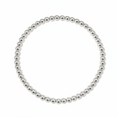 A Moonbeam 3mm Beaded Stretch Bracelet by Skōsh Jewelry, featuring a single strand of polished 3mm sterling silver beads on a stretch cord, displayed against a white background.