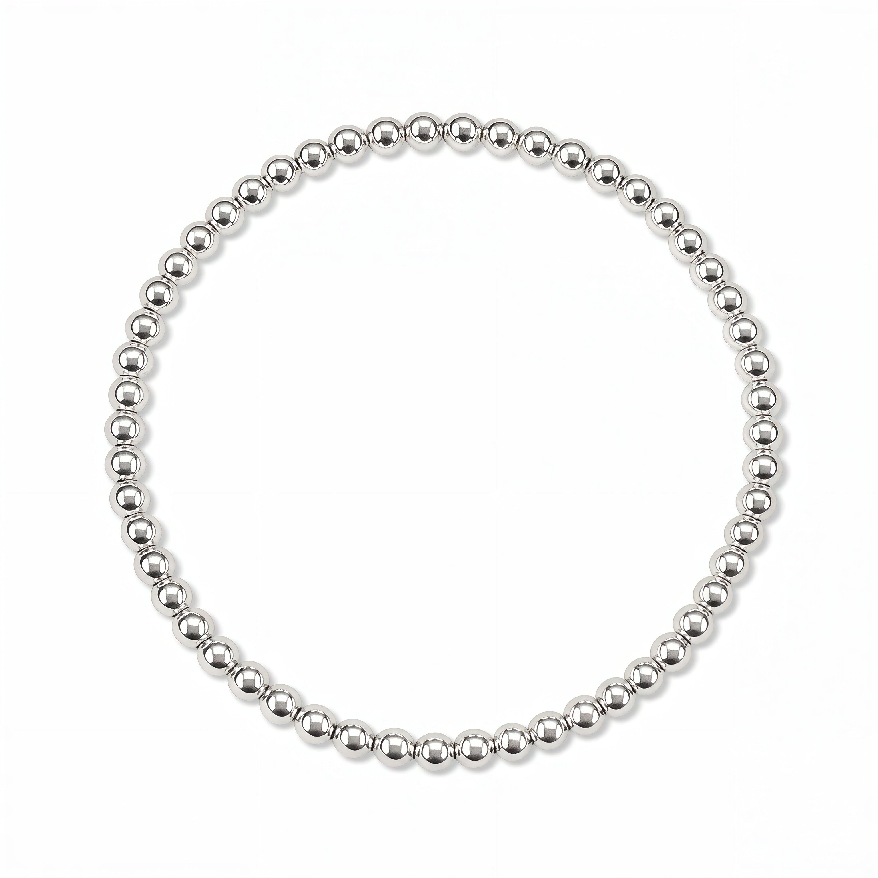 A Moonbeam 3mm Beaded Stretch Bracelet by Skōsh Jewelry, featuring a single strand of polished 3mm sterling silver beads on a stretch cord, displayed against a white background.