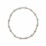 A Duo 2mm/4mm Beaded Stretch Bracelet by Skōsh Jewelry, featuring a strand of alternating 2mm and 4mm polished sterling silver beads on a stretch cord, displayed against a white background.
