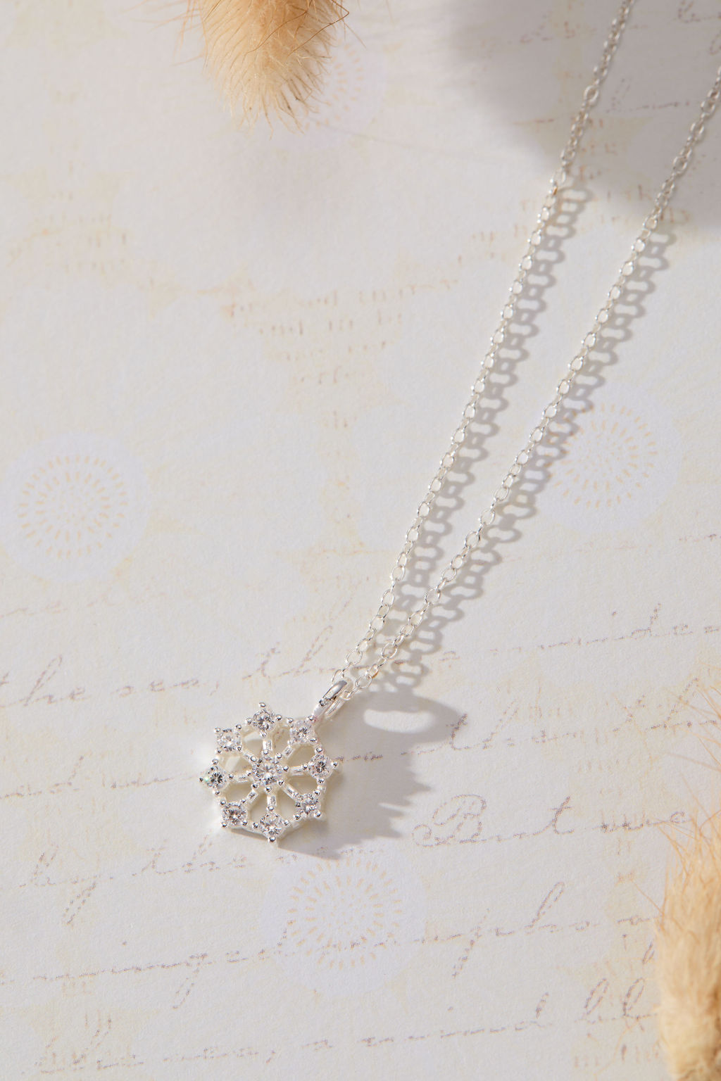 Snowflake Pendant with White Cubic Zirconia Accent Necklace in sterling silver by Skōsh Jewelry