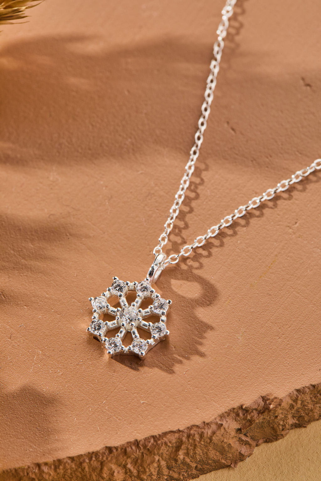 Snowflake Pendant with White Cubic Zirconia Accent Necklace in sterling silver by Skōsh Jewelry