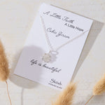 Snowflake Pendant with White Cubic Zirconia Accent Necklace in sterling silver by Skōsh Jewelry