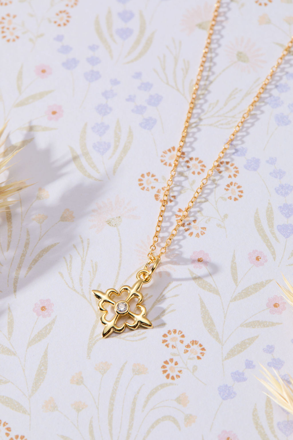 Louisiana Fleur-de-lis with White Cubic Zirconia Accent Pendant Necklace in 14K gold over sterling silver by Skōsh Jewelry