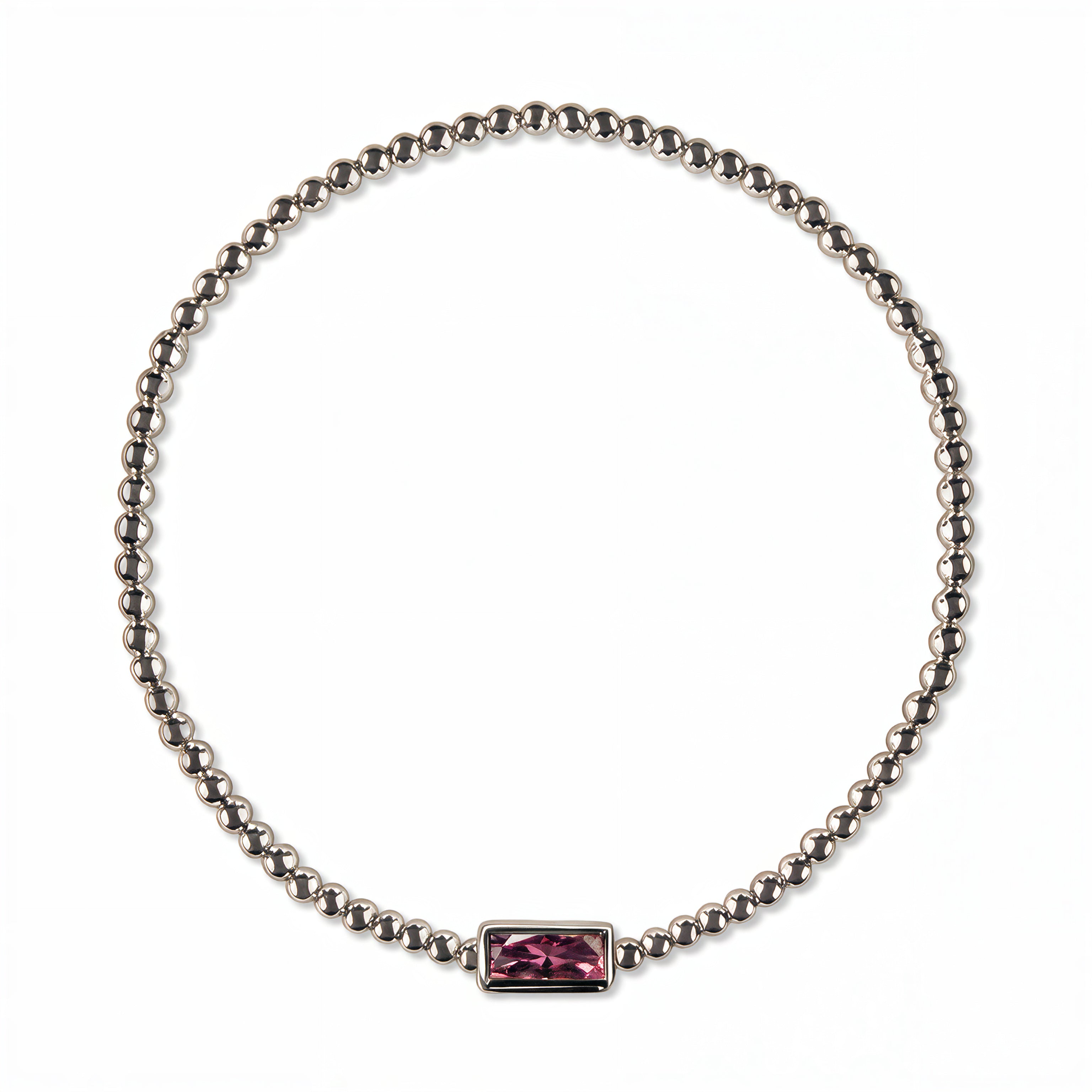 A February Birthstone Amethyst Cubic Zirconia Baguette Bracelet by Skōsh Jewelry, featuring a strand of polished sterling silver beads on a stretch cord with a rectangular purple baguette stone at the center, displayed against a white background.