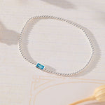 March Birthstone Light Sapphire Cubic Zirconia Baguette Bracelet in sterling silver by Skōsh Jewelry
