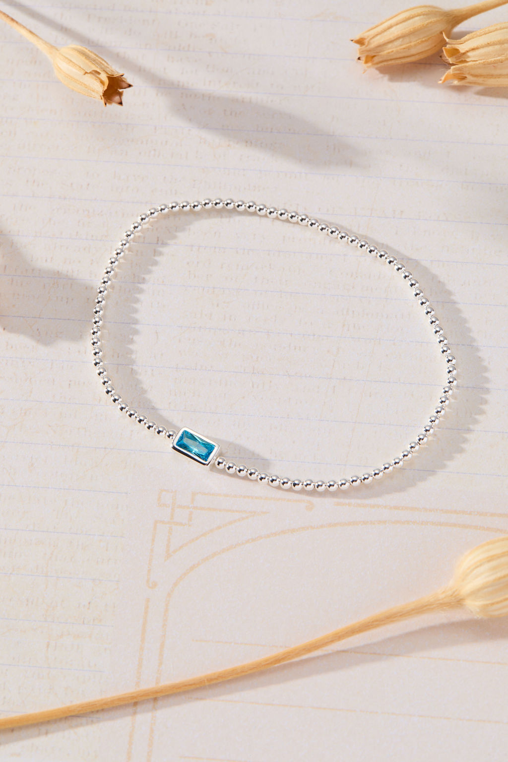 March Birthstone Light Sapphire Cubic Zirconia Baguette Bracelet in sterling silver by Skōsh Jewelry