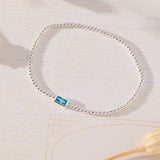 March Birthstone Light Sapphire Cubic Zirconia Baguette Bracelet in sterling silver by Skōsh Jewelry