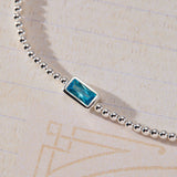 March Birthstone Light Sapphire Cubic Zirconia Baguette Bracelet in sterling silver by Skōsh Jewelry