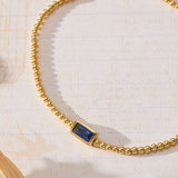 September Birthstone Sapphire Cubic Zirconia Baguette Bracelet in 14K gold over sterling silver by Skōsh Jewelry