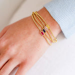 Birthstone Cubic Zirconia Baguette Bracelets in 14K gold over sterling silver by Skōsh Jewelry