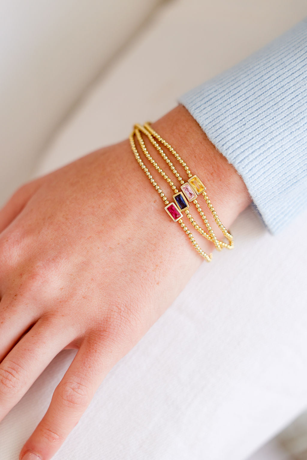 Birthstone Cubic Zirconia Baguette Bracelets in 14K gold over sterling silver by Skōsh Jewelry