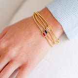 Birthstone Cubic Zirconia Baguette Bracelets in 14K gold over sterling silver by Skōsh Jewelry