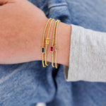 Birthstone Cubic Zirconia Baguette Bracelets in 14K gold over sterling silver by Skōsh Jewelry