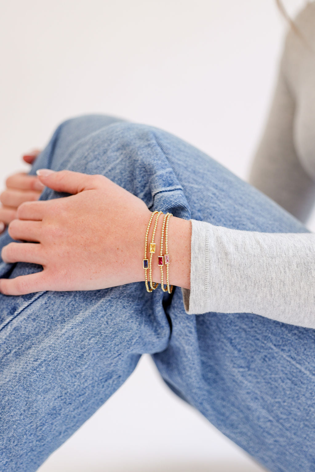 Birthstone Cubic Zirconia Baguette Bracelets in 14K gold over sterling silver by Skōsh Jewelry